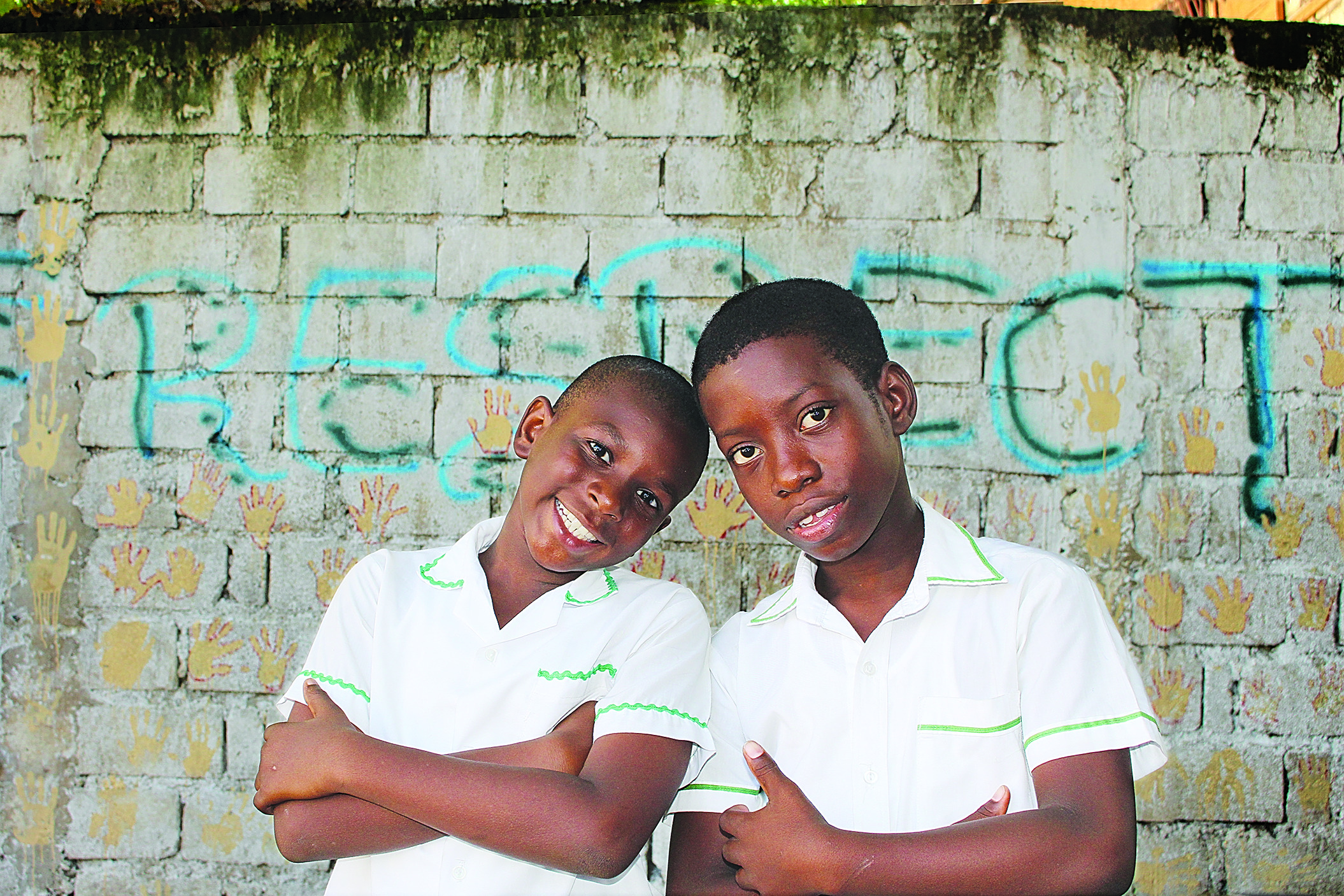 Two young kids pose together to represent global services Two young kids pose together to represent global services