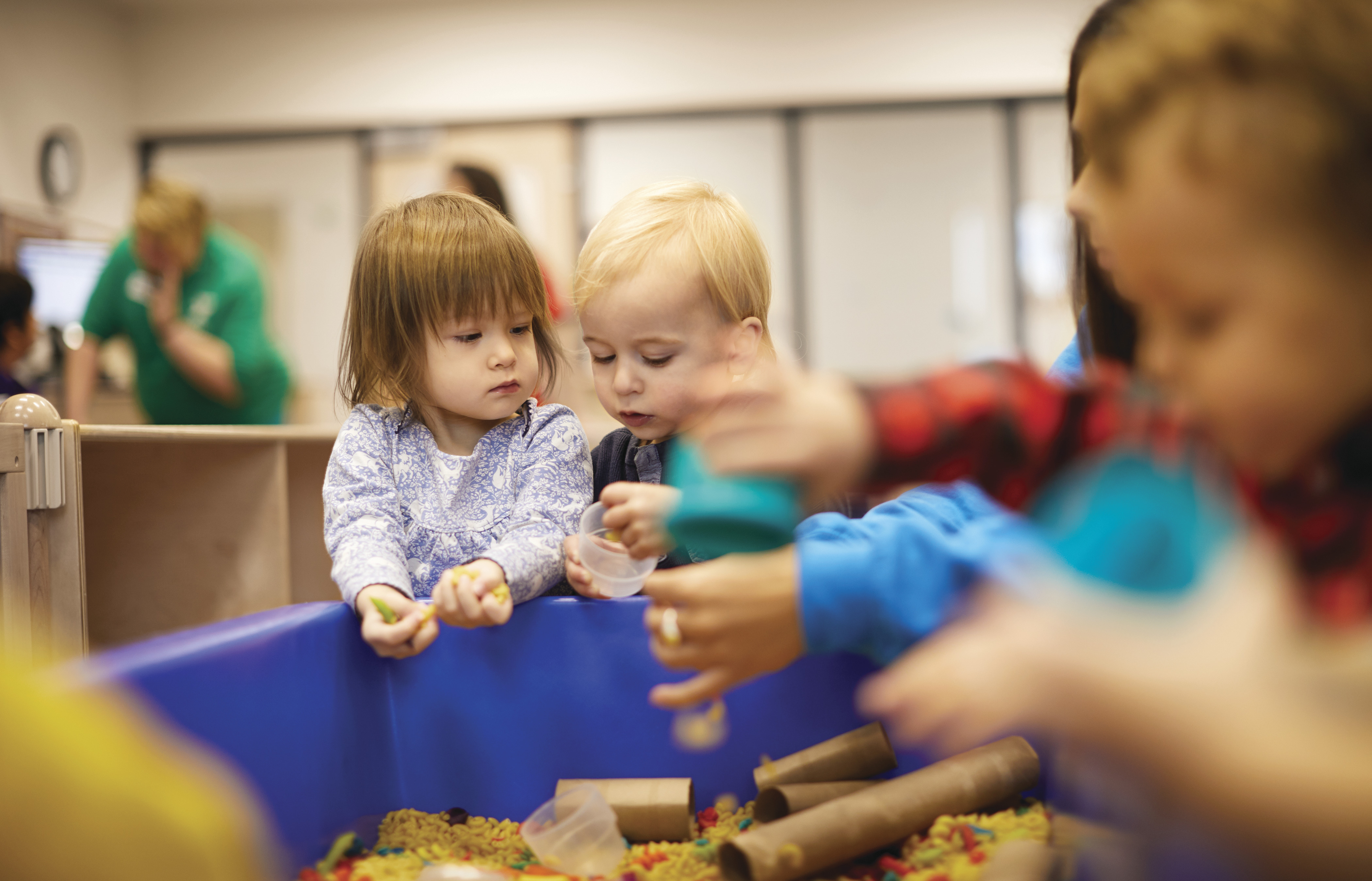 toddlers sitting in playroom at YMCA