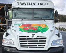 YMCA Travelin' Table bus providing COVID-19 emergency food