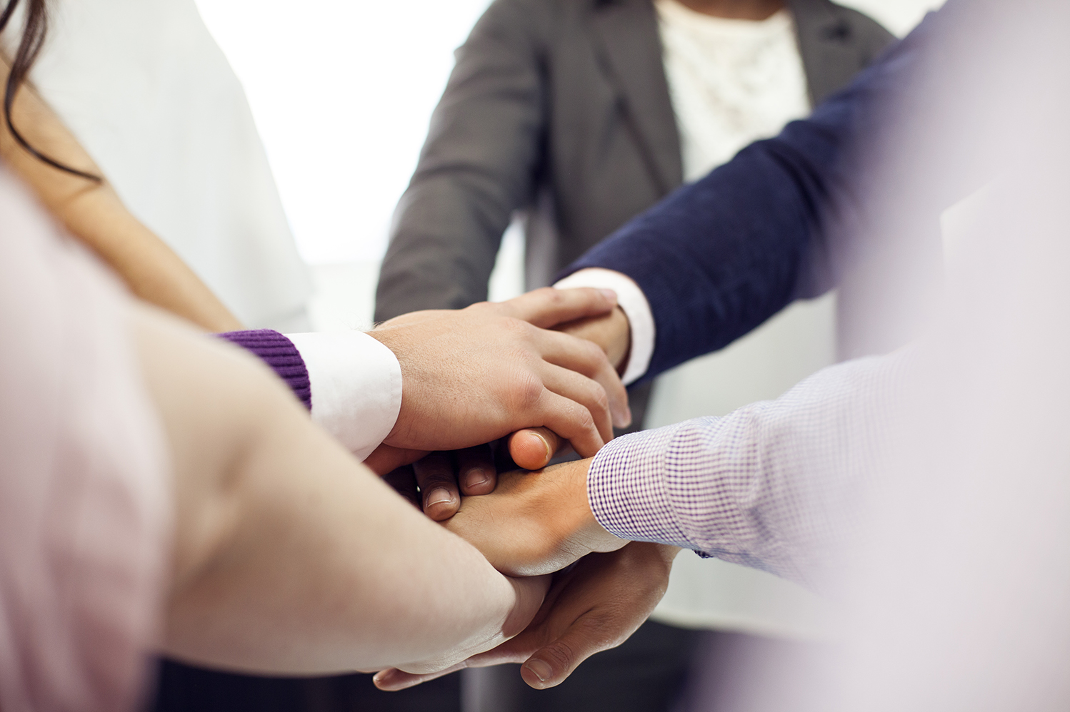Group of people holding hands Group of people holding hands