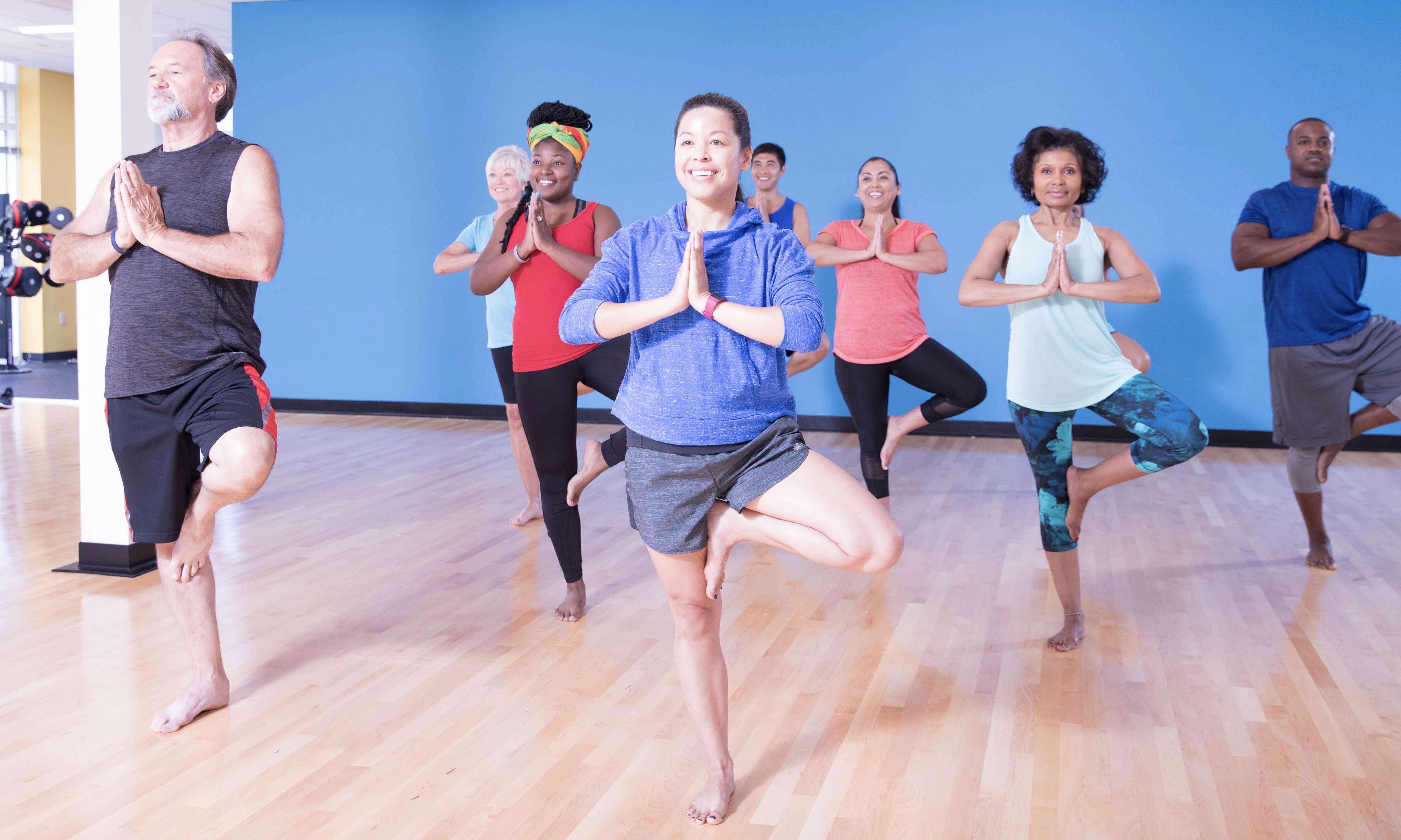 YMCA members balancing in class YMCA members balancing in class
