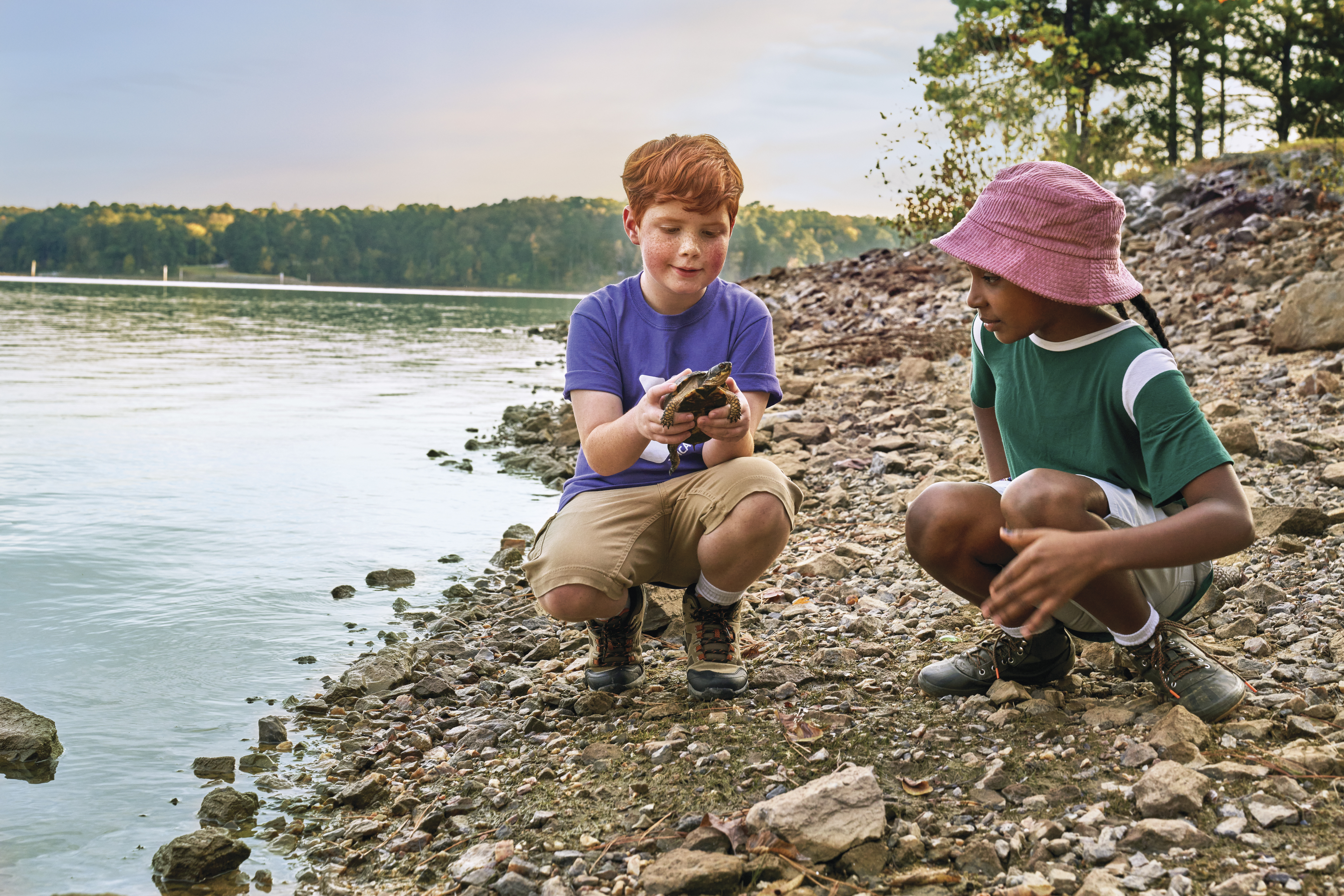 Two boys at a Y summer camp holding a turtle Two boys at a Y summer camp holding a turtle