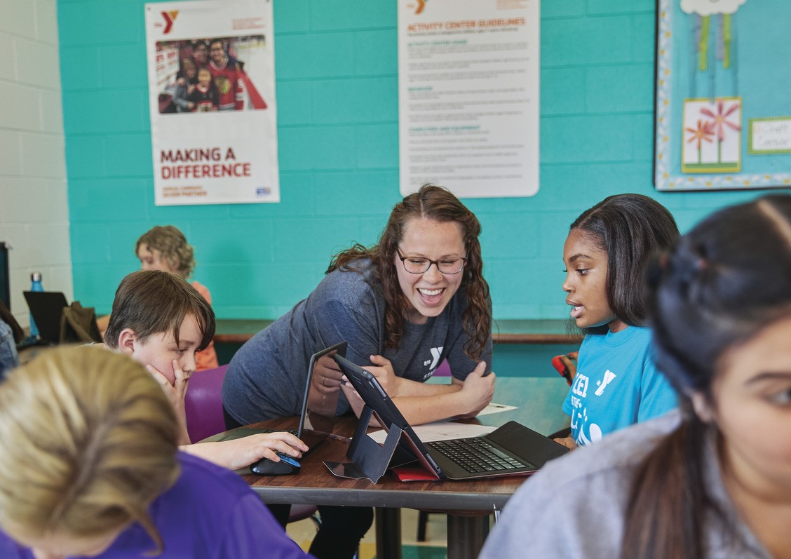 Kids working on computers at YMCA afterschool program