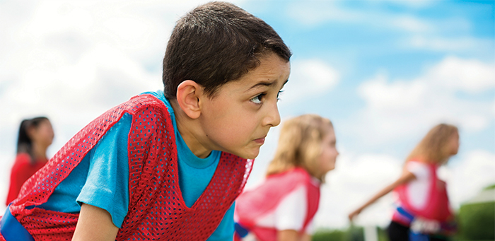 Kid concentrating on sports