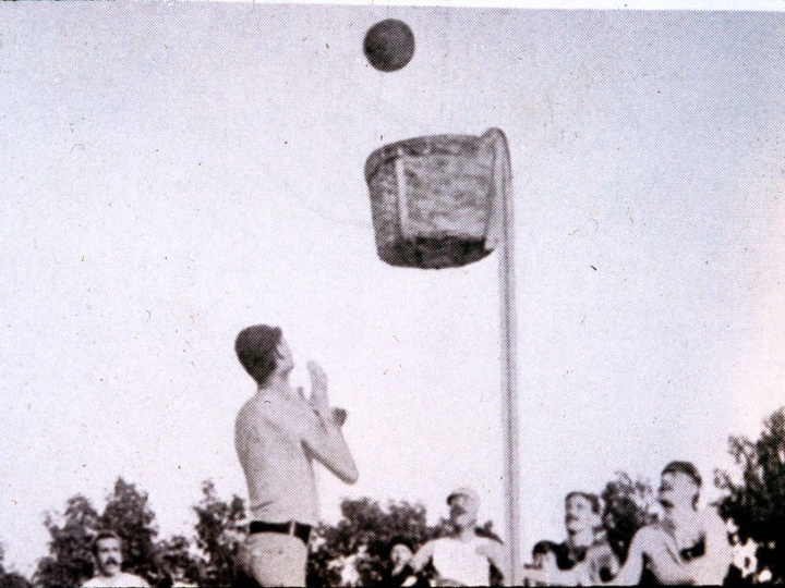 Early outdoor basketball game.