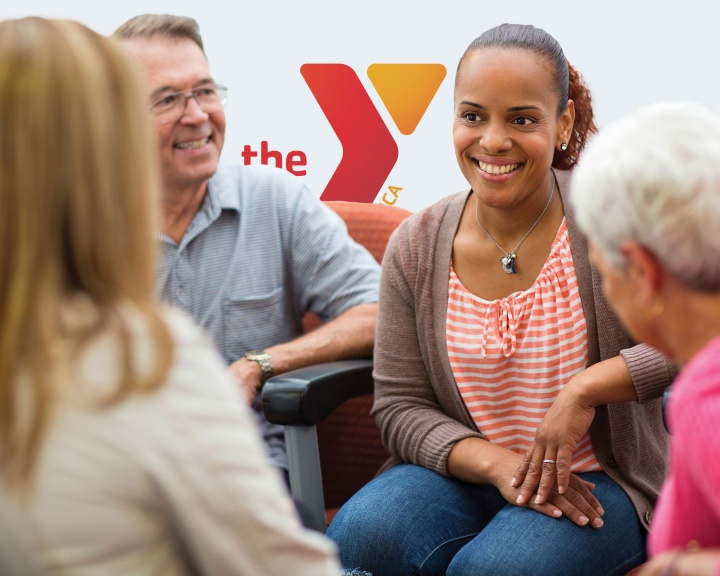 Four adults socializing together at YMCA Four adults socializing together at YMCA
