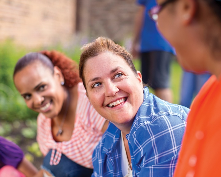 YMCA staff updating member on news 