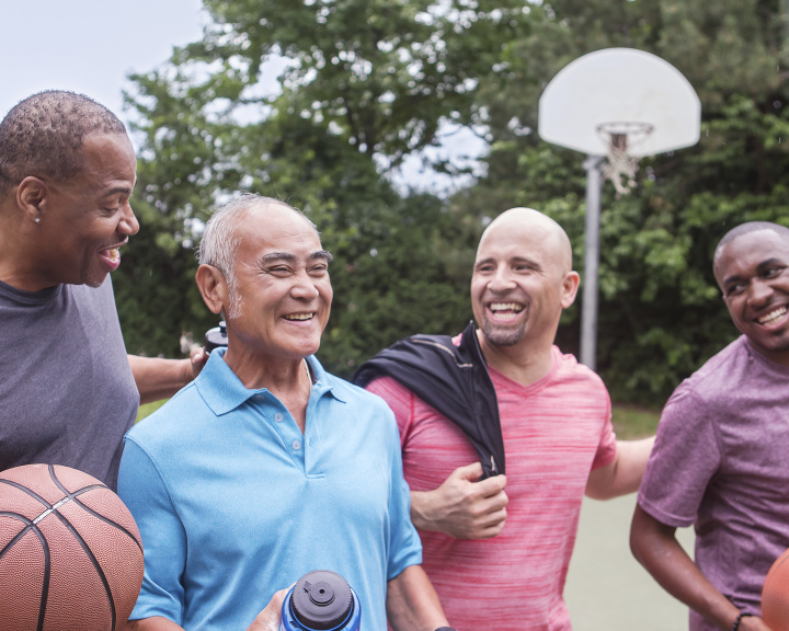 group of men playing basketball group of men playing basketball