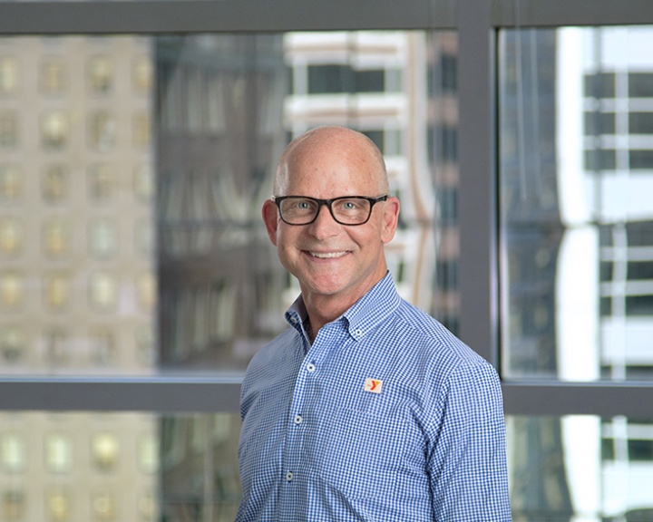 Headshot of Tom Gardner Headshot of Tom Gardner