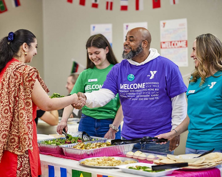YMCA Staff Welcoming Member  YMCA Staff Welcoming Member