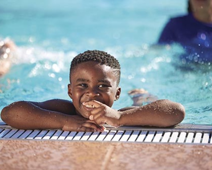 Boy at pool edge