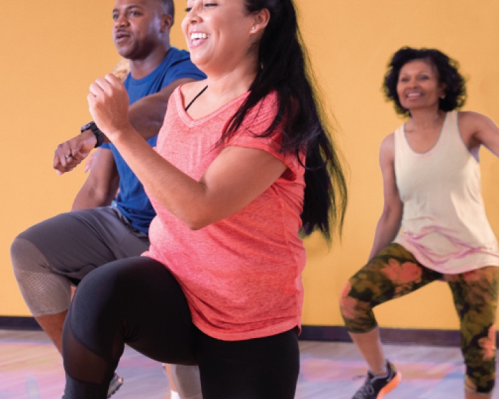Woman dancing in a fitness class