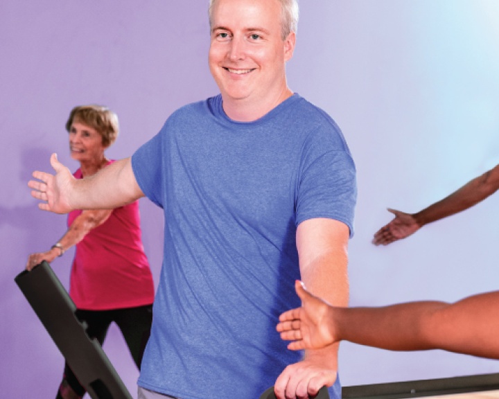 Older an in YMCA fitness class Older an in YMCA fitness class