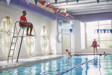 Lifeguard watching pool - YMCA