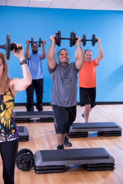 Group fitness weight training class at YMCA