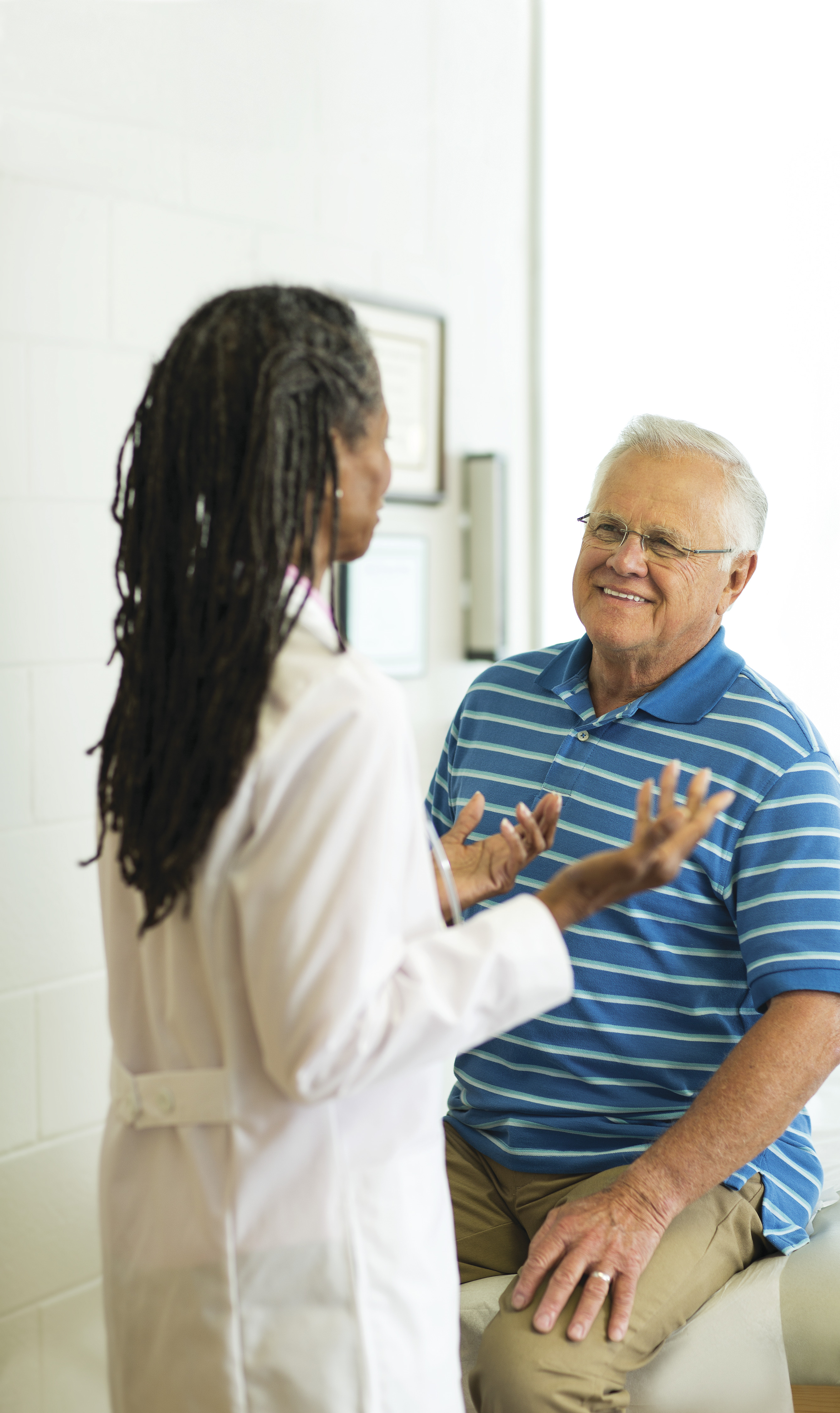 Doctor talking to patient - YMCA Doctor talking to patient - YMCA