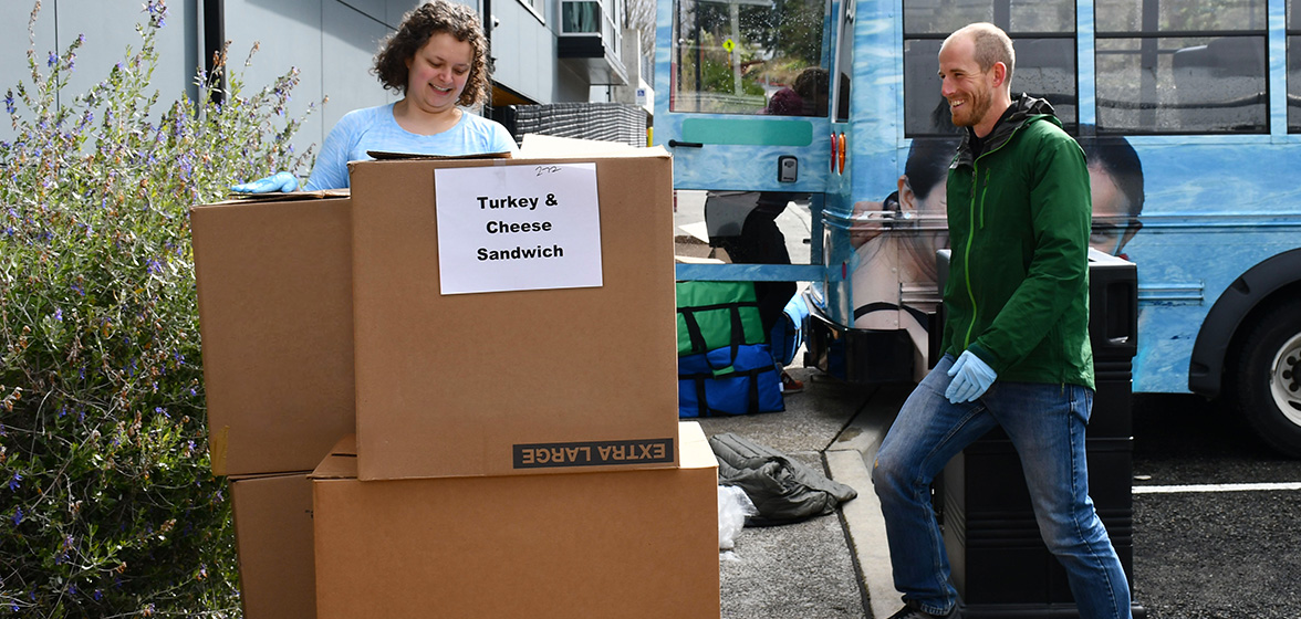 YMCA volunteers moving boxes YMCA volunteers moving boxes