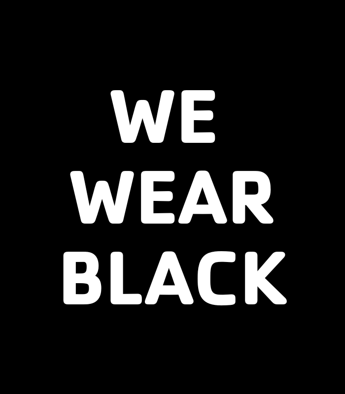 Black rectangle with white text "we wear black"