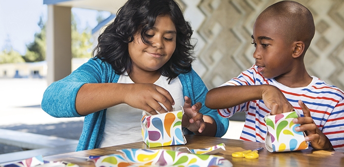 Boy and girl working on crafts