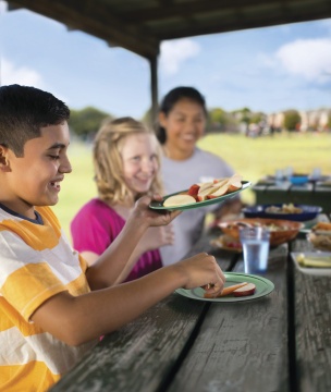 Children eating together through YMCA Diabetes Prevention Program
