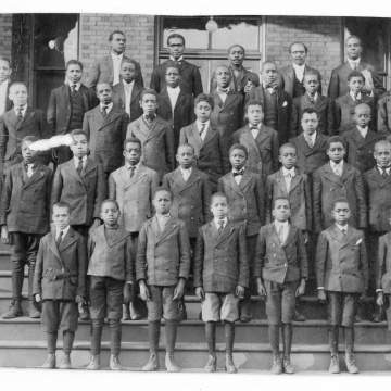 African American men standing on stairs at YMCA in 1910 African American men standing on stairs at YMCA in 1910